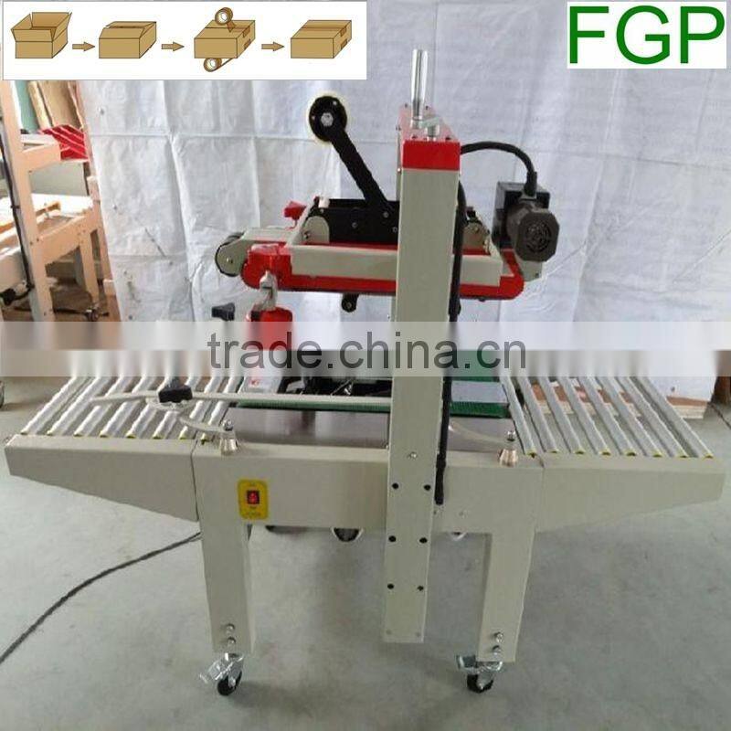 FXJ-5050 top & bottom drive paper carton automatic adhesive tape sealing machine