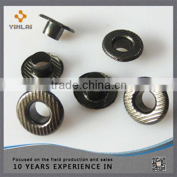 Decorative metal eyelet for shoe