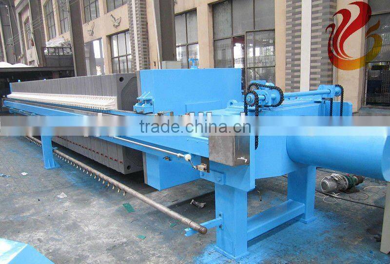 Hydraulic filter press for mine sludge