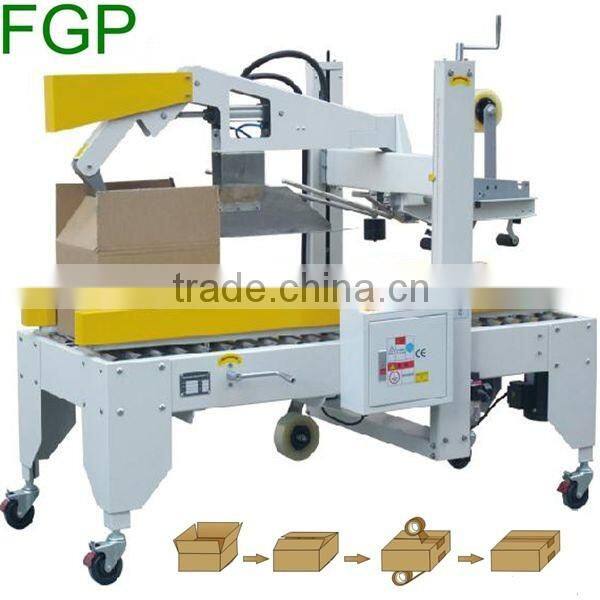 FXJ-5050 top & bottom drive paper carton automatic adhesive tape sealing machine