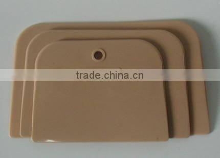 plastic putty scraper