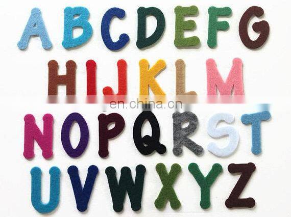 Die Cut Felt letter with iron on adhesive - Many colours available - 2 Inches (5cm) Tall. Choose your letters or numbers