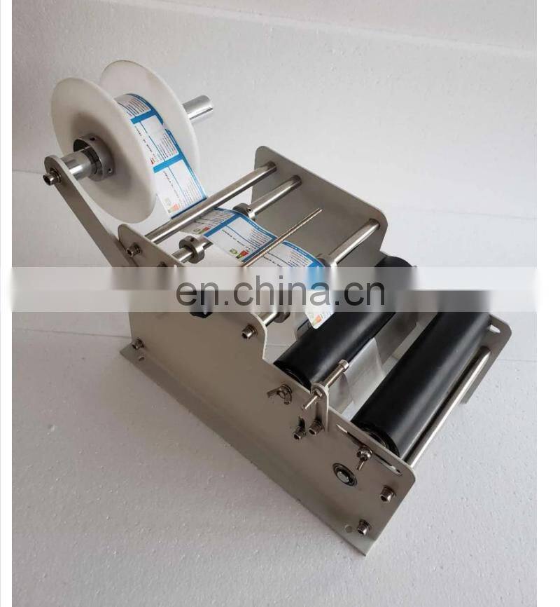 YTK-L100 handheld hand held manual round bottle labeling machine for bottle used,manual round bottle labeler
