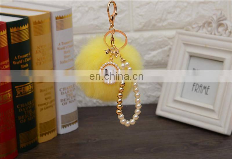 2021 Wholesale custom luxury fur ball key holder Pearl keychains pom pom bow keychain for women bag good quality