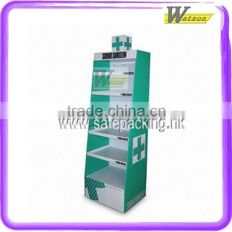 Standing cardboard display with shelves for medicines