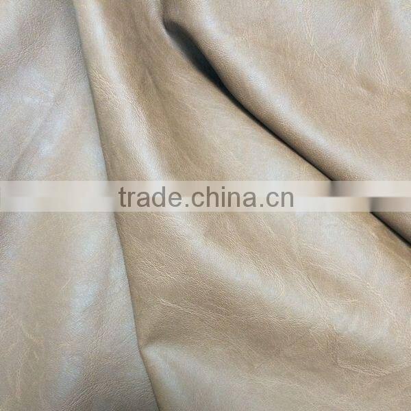 Soft hand-feeling PU faux leather fabric for clothing usage with rayon backing