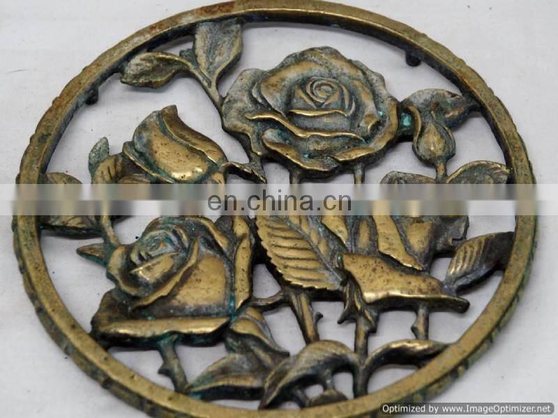 silver flower design trivet