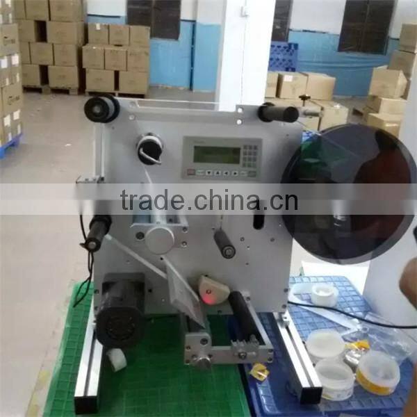 2015 Guangzhou semi-automatic multifunctional round bottle labeling machine with PLC control