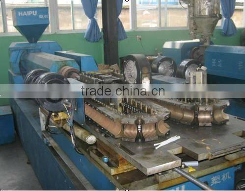 Orange corrugated plastic pipe