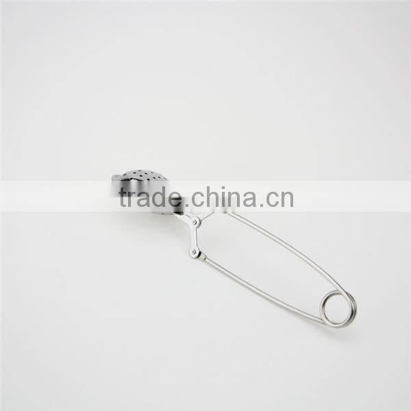 Small stainless steel teapot shaped strainer
