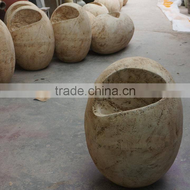 Large stone egg flowerpot