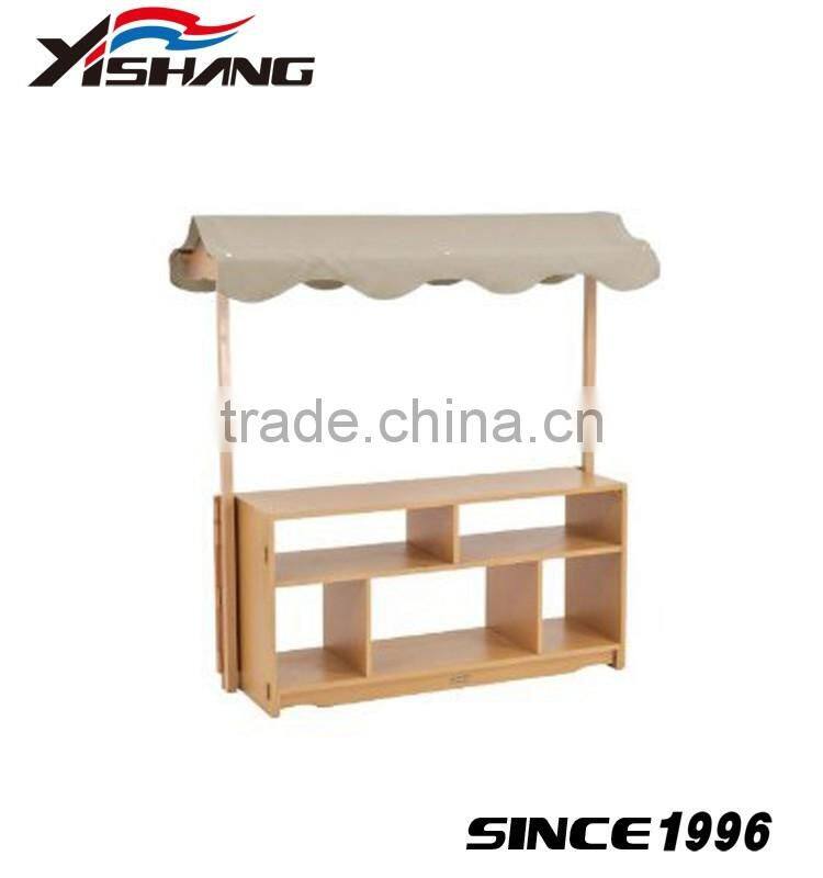 Antique wooden stand for kids clothes display rack