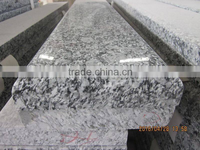 China spray white granite tile prices
