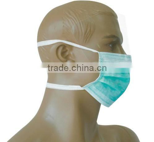 Disposable surgical face mask with shield