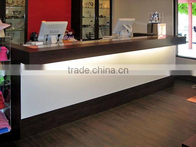 apparel clothing shop on-trend wood shop cash counter design