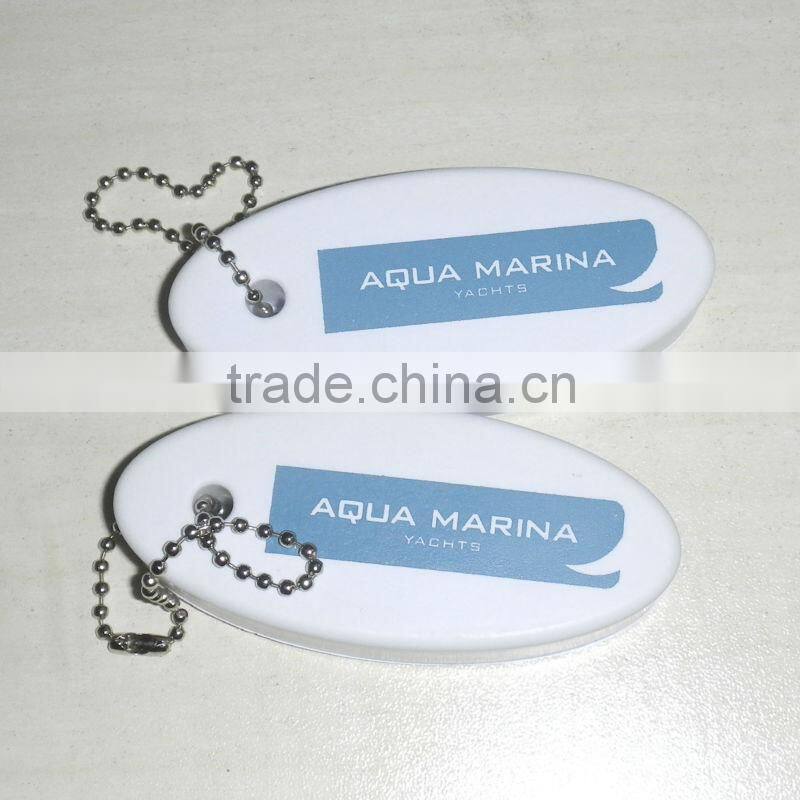 Custom made oval pu float key chain , floating sponge pu keychain