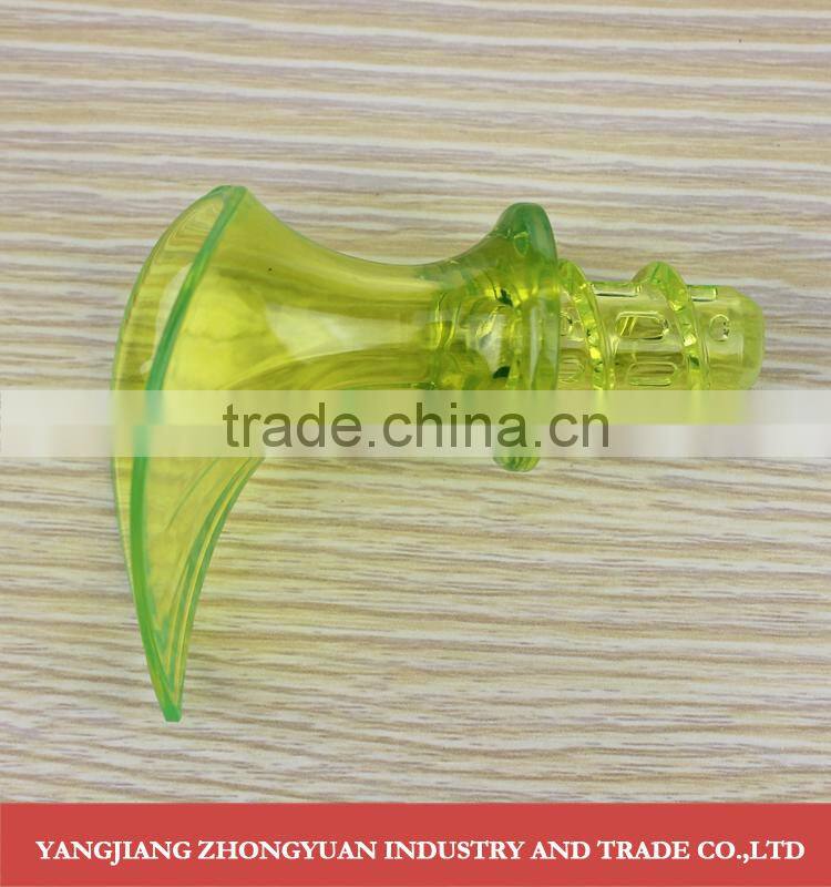 Plastic trumpet shaped hand lemon squeezer