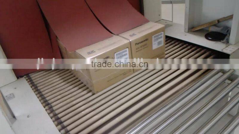 High speed fully automatic shrink wrapping machine