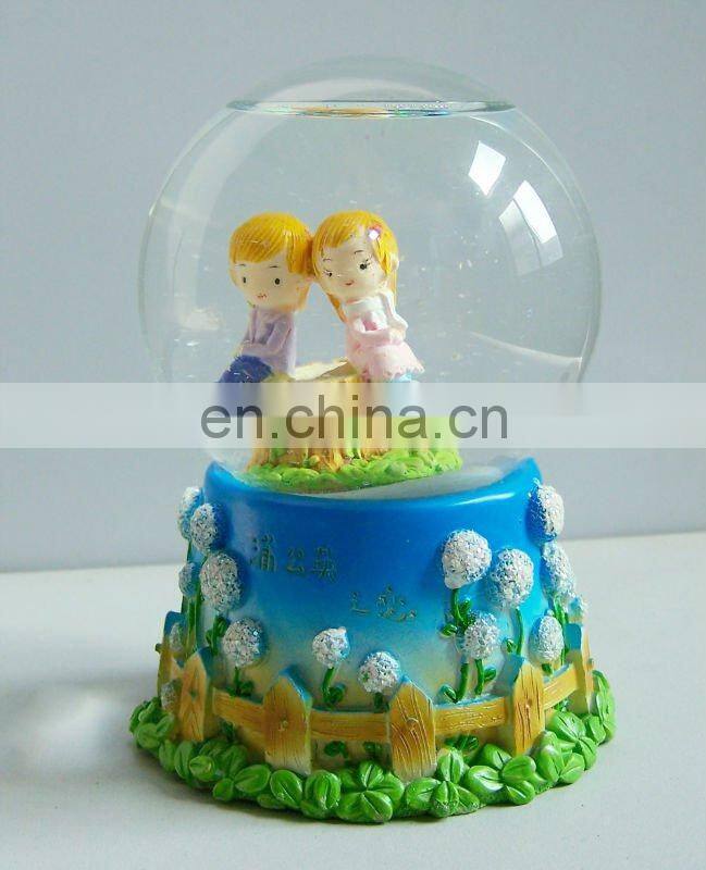 the ormate wedding couple water globe