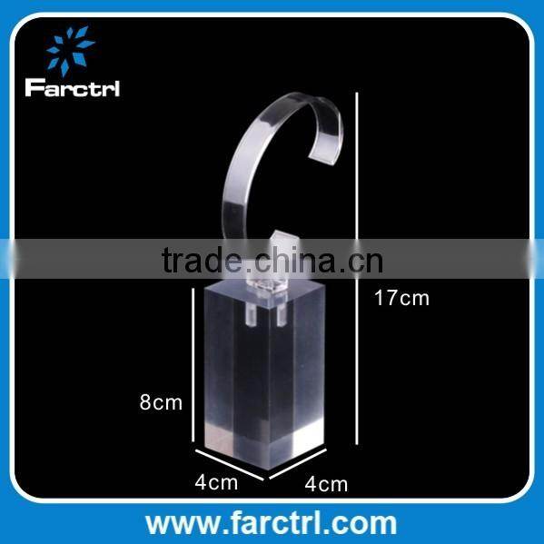 Clear acrylic bracelet watch display holder stand in retail shop
