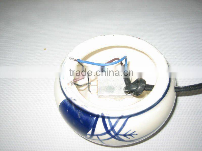 electrical aroma/oil burner with heating plate