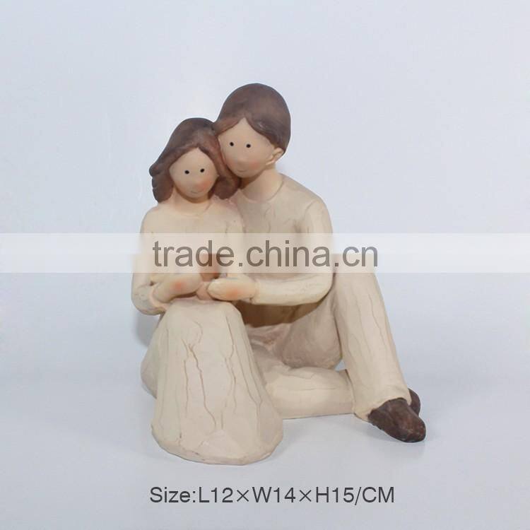 Wood imitation polyresin family figurine