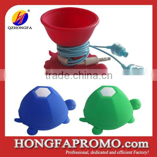 Silicone mobile phone holder with earphone wrap