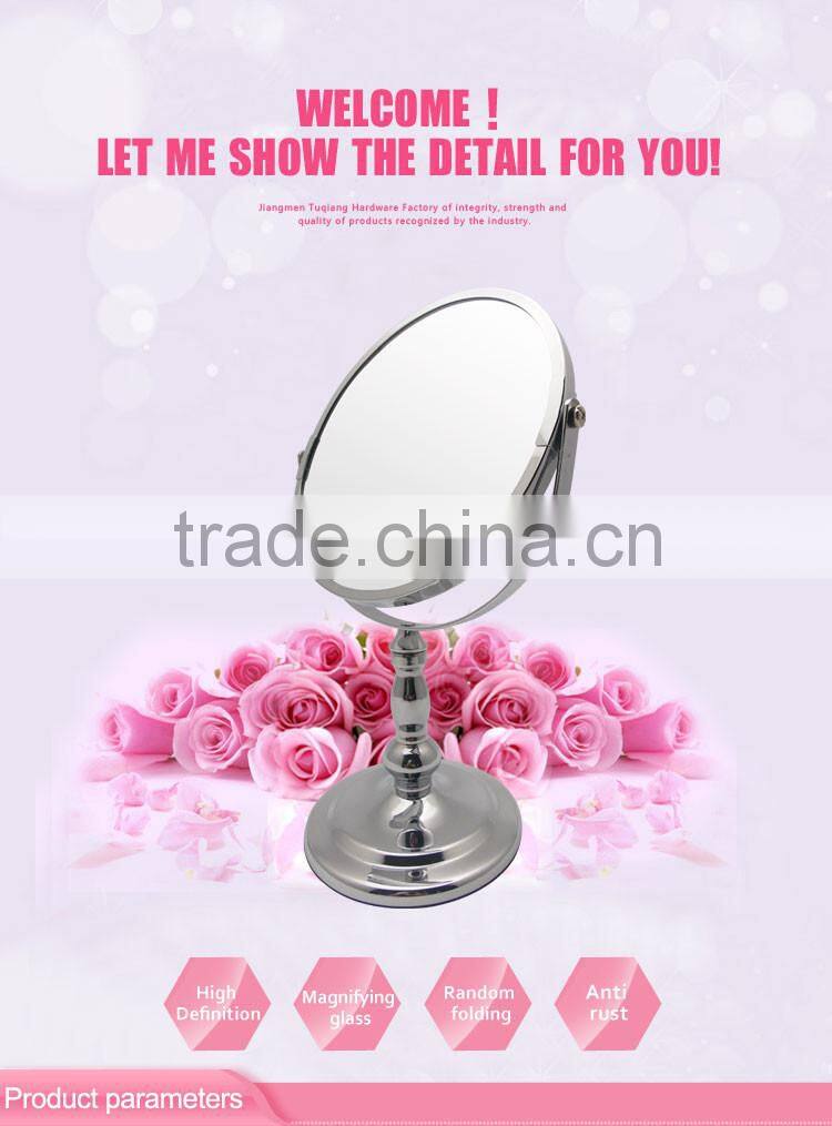 Round metal framed compact vanity mirror