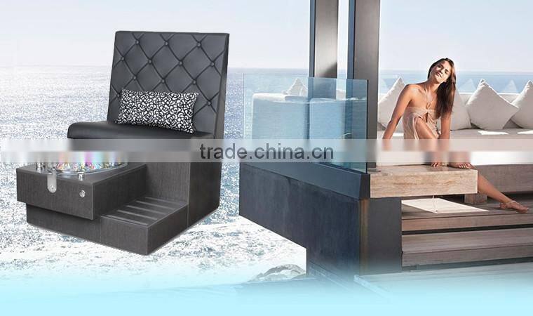 Doshower pedicure sink and black manicure tables and pedicure chairs
