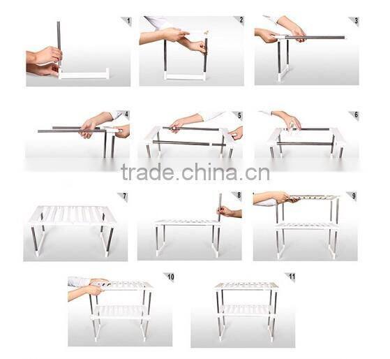 Kitchen telescopic plastic sink storage shelf rack/stainless steel kitchen storage rack