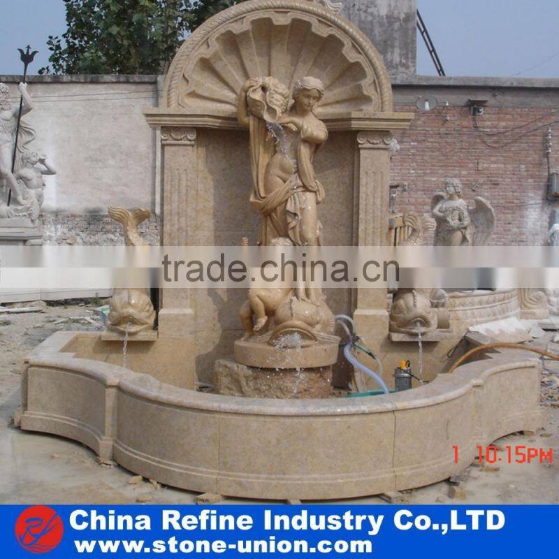 wall fountain carved with human figures