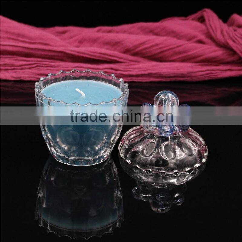christmas colorful soy or paraffin wax scented candles in glass jars
