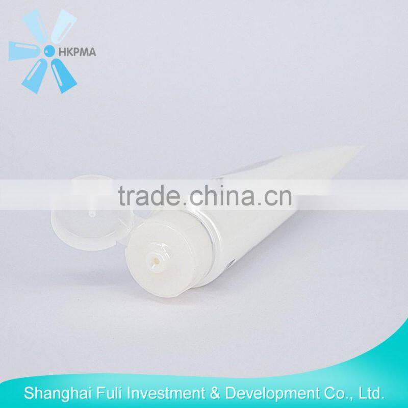 cosmetic tube with flip top cap and packaging for facial cleanser