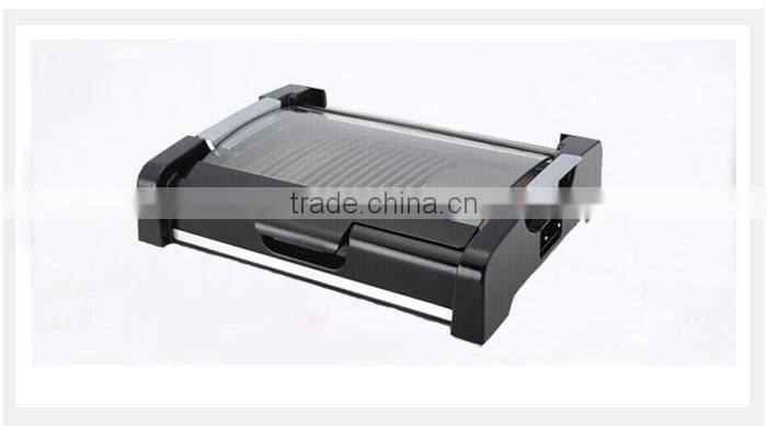 Electric grill with glass cover
