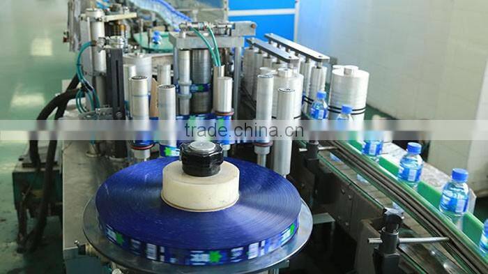 Automatic self-adhesive round juice bottle labeling machine
