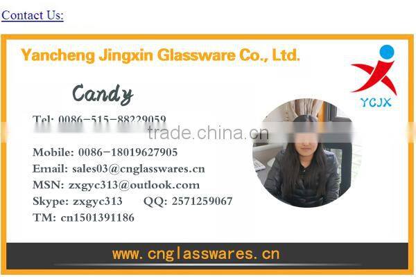 clear decorative glass dome with black wooden base