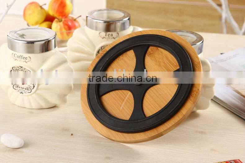 ceramic canister set with turntable bamboo stand