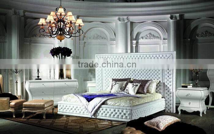Luxury white leather hotel bed with high headboard