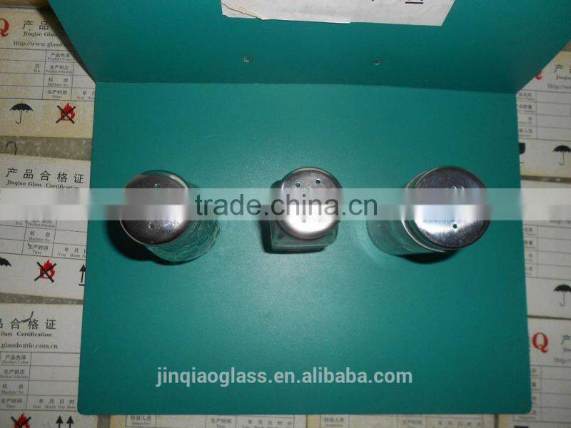 different glass spicy jar with cap