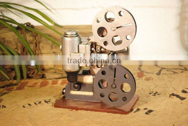 Antique metal movie camera model with paint