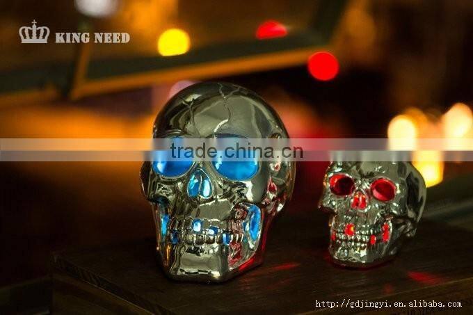 Silver plastic halloween skull head with LED light