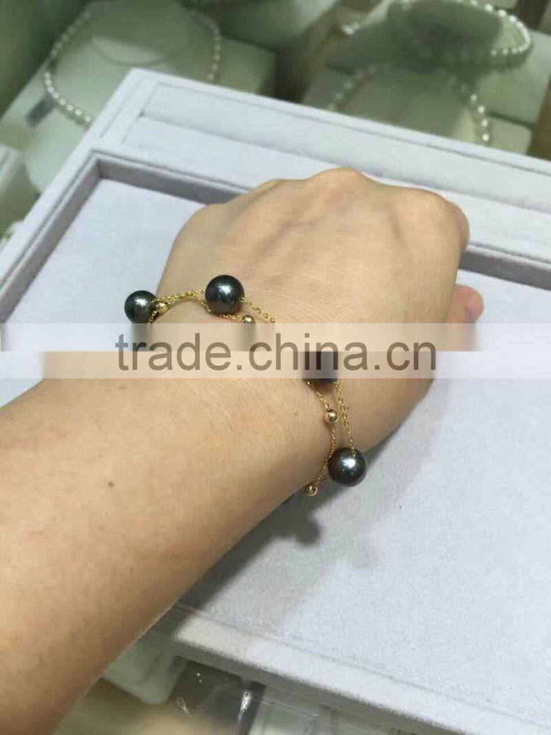 AAA 7.5-8mm black Japanese Akoya pearl with gold chain bracelet