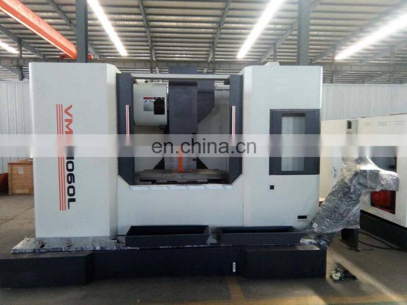 Universal CNC vertical milling machine with automatic tool changer VMC1060