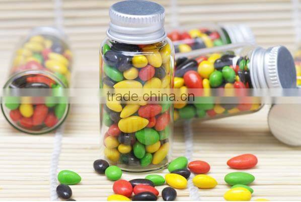 Colored small oval shaped chocolate coated sunflower seeds