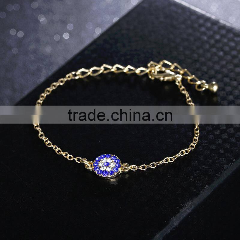 rhinestone evil eye charm gold chain bracelet
