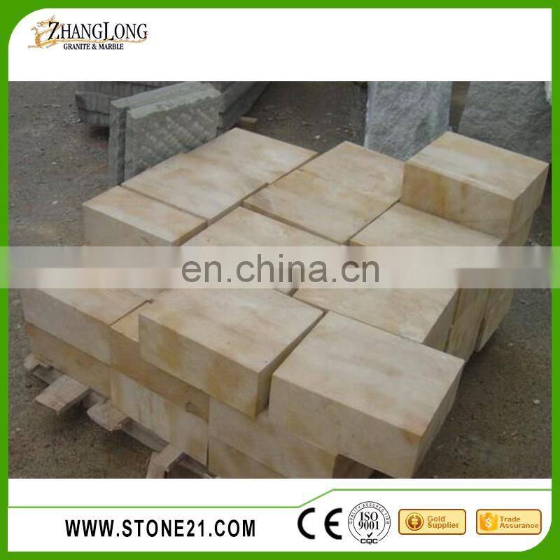 sandstone cladding, rusty yellow sandstone