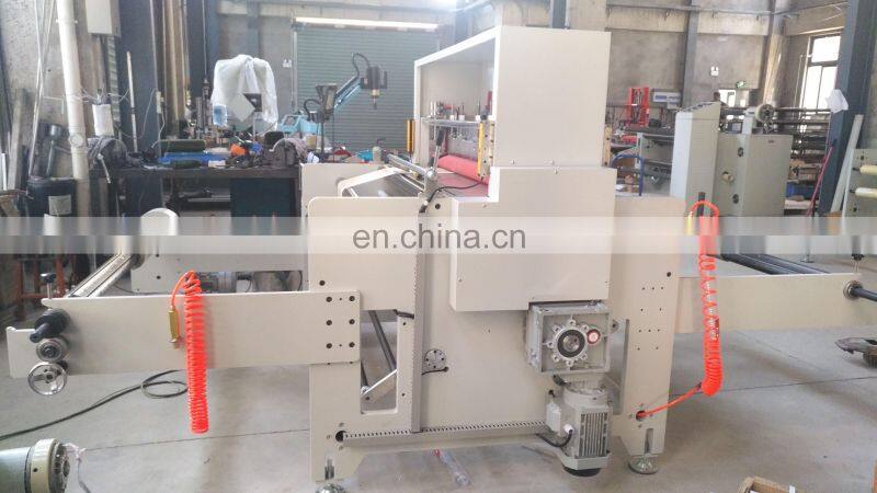 Roll to sheet cutting machine with kiss cutting