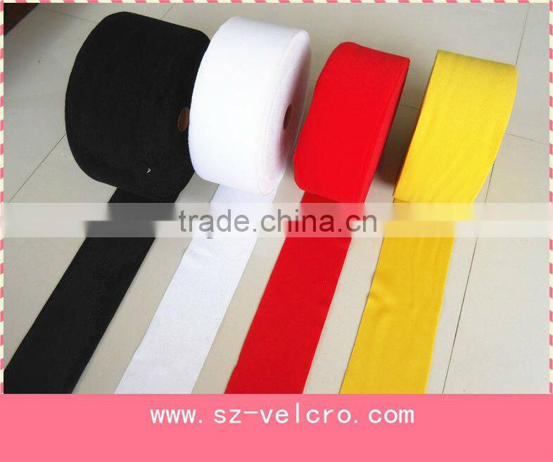 Unitape back to back injection hook soft loop in a roll