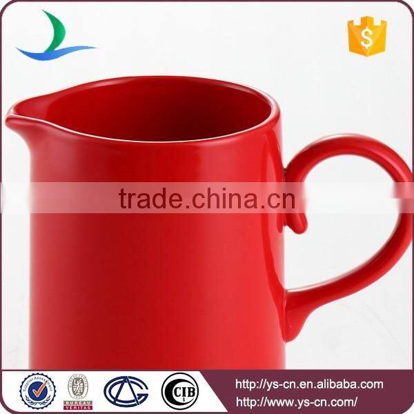 Red ceramic water jug for home or hotel
