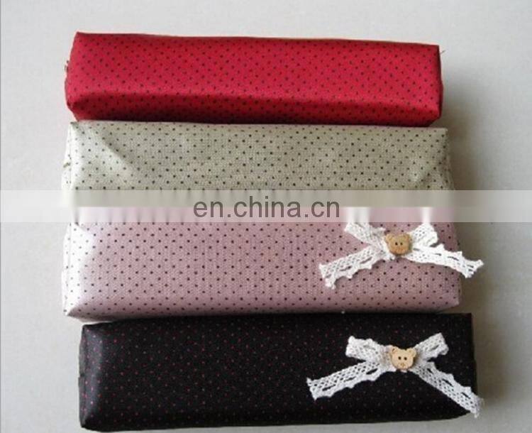 Cheap dot bowknot cartoon polyester pencil bag